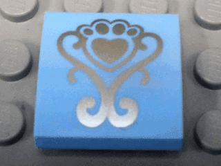 Slope, Curved 2 x 2 x 2/3 with Silver Fancy Scroll and Heart Shaped Paw Pattern