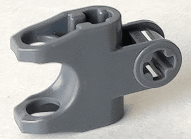 Technic, Axle Connector 2 x 3 with Ball Joint Socket - Closed Sides, Angled Forks with Open Axle Holes