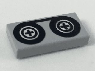 Tile 1 x 2 with Black Tape Reels Pattern